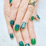 Green glitter nails with nail art