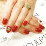 Red glitter nails with nail art